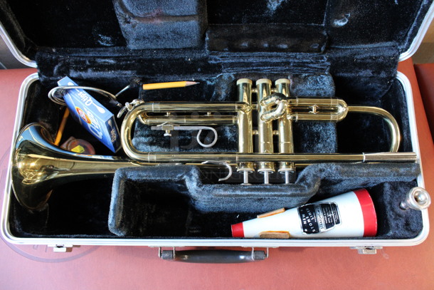Selmer Bundy Gold Finish Trumpet in Hard Case. 21x6x9