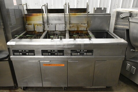 Frymaster FMP345EBLSC Stainless Steel Commercial Natural Gas Powered 3 Bay Deep Fat Fryer w/ Right Side Dumping Station on Commercial Casters. 122,000 BTU. 