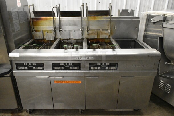 Frymaster FMP345EBLSC Stainless Steel Commercial Natural Gas Powered 3 Bay Deep Fat Fryer w/ Right Side Dumping Station on Commercial Casters. 122,000 BTU. - Item #1146001