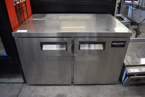 Model UUC48F-E-HC Stainless Steel Commercial 2 Door Undercounter Freezer. Comes w/ Commercial Casters. 115 Volts, 1 Phase. Can’t Test Due to Cut Cord