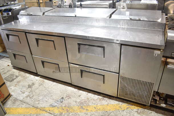 True TPP-93D-6 Stainless Steel Commercial Pizza Prep Table w/ 6 Drawers on Commercial Casters. 115 Volts, 1 Phase. Tested and Working!
