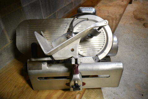 Globe 400 Stainless Steel Commercial Countertop Meat Slicer. 115 Volts, 1 Phase. (basement)