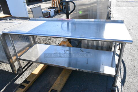 Stainless Steel Table w/ Under Shelf on Commercial Casters.