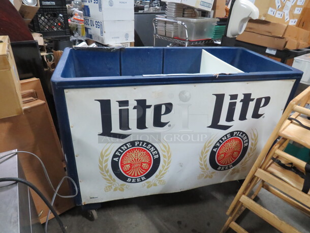 One IRP Miller Lite Beer Merchandiser On Casters. 50X24X36