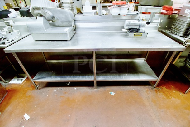 96" Stainless Steel Work Table With Under-shelf & No. 1 Can Opener. 