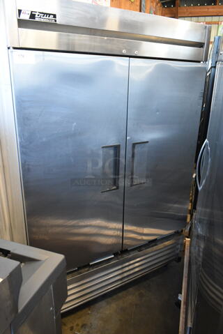 True T-49PT Stainless Steel Commercial 2 Door Reach In Pass Through Cooler on Commercial Casters. 115 Volts, 1 Phase. 