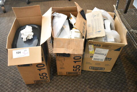 ALL ONE MONEY! Lot of 3 Boxes of Various Items Including 2 Towel Dispensers. (secondary dining room)