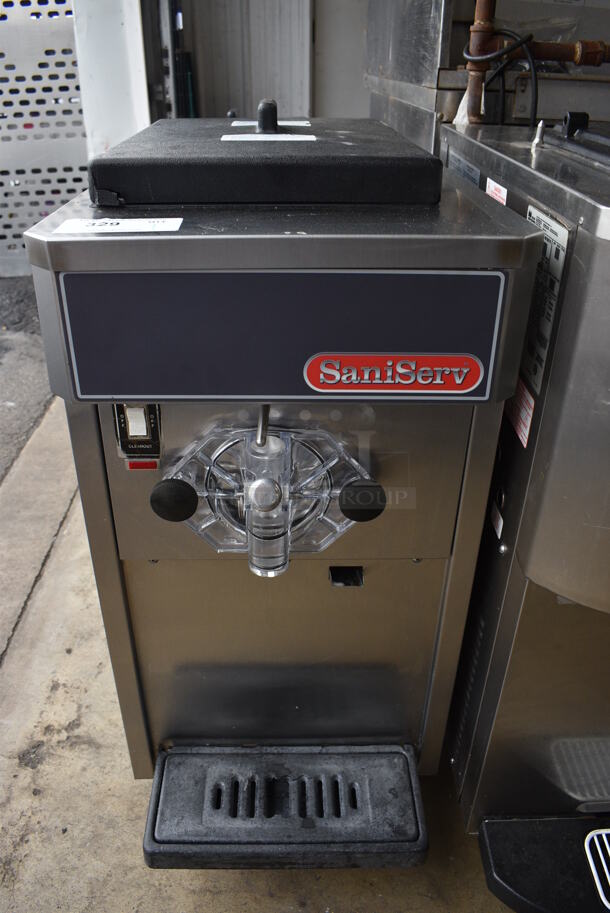 SaniServ Model A4041N Stainless Steel Commercial Countertop Air Cooled Single Flavor Soft Serve Ice Cream Machine. 208-230 Volts, 1 Phase. 17x28x35
