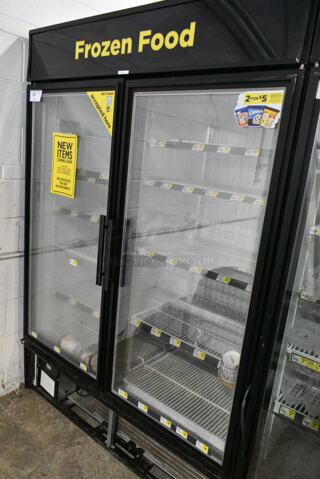 True GDM-49F-LD Metal Commercial 2 Door Reach In Freezer Merchandiser w/ Poly Coated Racks. 115/208-230 Volts, 1 Phase. 