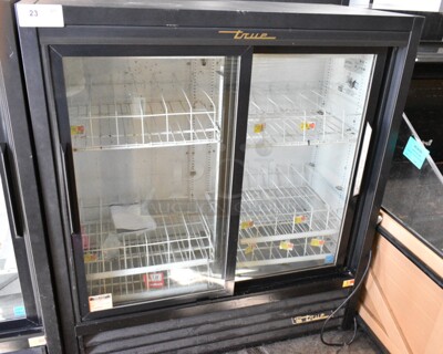 True GDM-41SL-54-LD ENERGY STAR Metal Commercial 2 Door Reach In Cooler Merchandiser w/ Poly Coated Racks. 115 Volts, 1 Phase. 