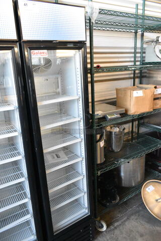 BRAND NEW SCRATCH AND DENT! Galaxy 177GDN5RBB Metal Commercial Single Door Reach In Cooler Merchandiser w/ Poly Coated Racks and Red, White, and Blue LED Lighting. 110-120 Volts, 1 Phase. 