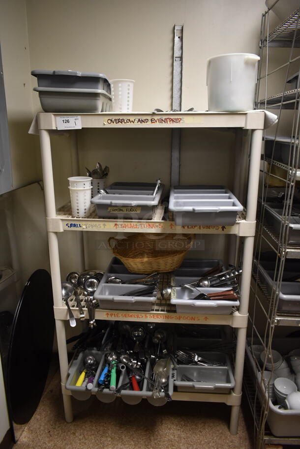 Tan Poly 4 Tier Shelving Unit w/ Contents Including Utensils. BUYER MUST REMOVE: BUYER MUST DISMANTLE. PCI CANNOT DISMANTLE FOR SHIPPING. PLEASE CONSIDER FREIGHT CHARGES. (dish room)