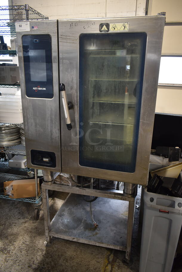 Alto Shaam CTP10-10E Stainless Steel Commercial Electric Powered Combitherm Convection Oven on Metal Equipment Stand. 208-240 Volts, 3 Phase.
