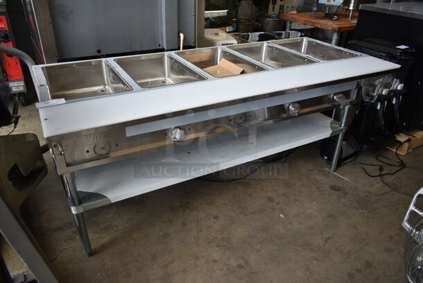 BRAND NEW SCRATCH AND DENT! 2023 ServIt 423EST5WS Stainless Steel Commercial Floor Style Electric Powered Steam Table w/ Cutting Board and Under Shelf. 208/240 Volts, 1 Phase.