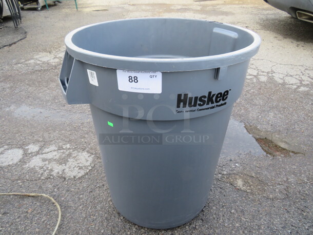 One Huskee 32 Gallon Trash Can.