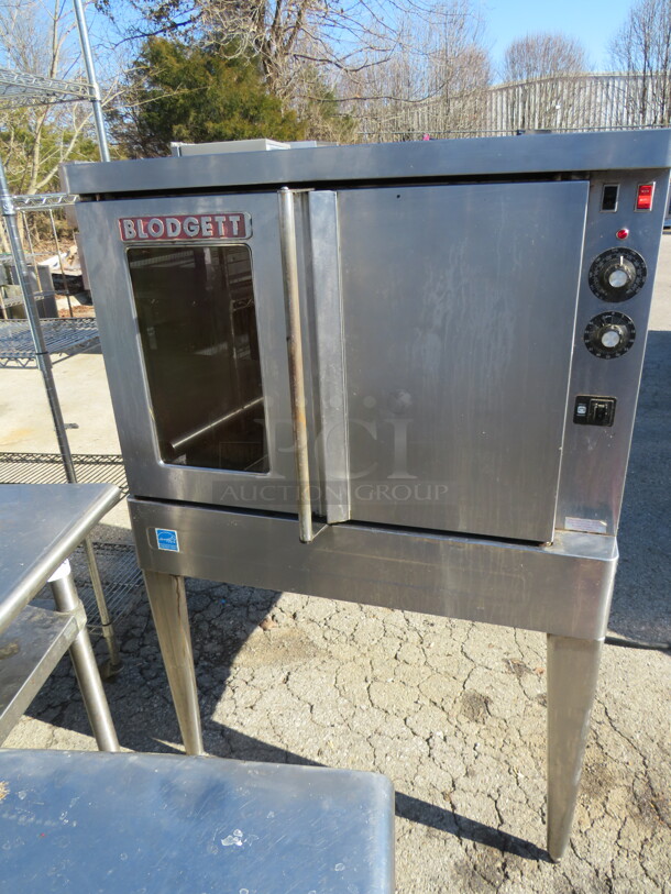 One Blodgett Electric Full Size Convection Oven With 5 Racks. Model# SHO-100-E. 208 Volt. 3 Phase. 38.5X37X57.5. $8471.00
