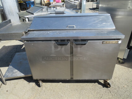 One True 2 Door Refrigerated Prep Table With 1 Rack On Casters. Model# TSSU-36-08. 115 Volt. 36X30X43. $3621.87.