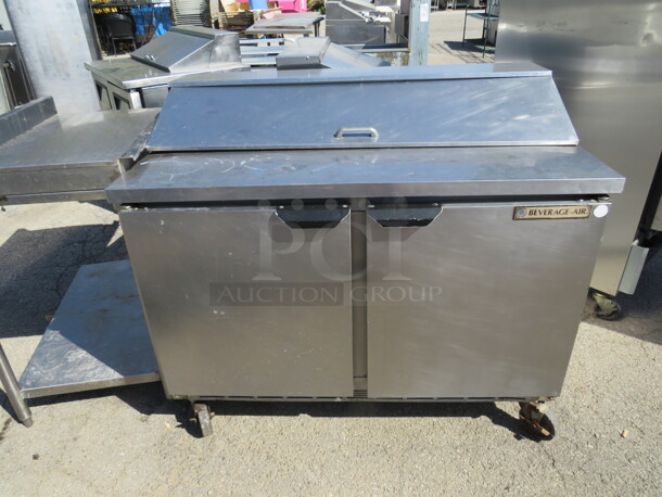 One True 2 Door Refrigerated Prep Table With 1 Rack On Casters. Model# TSSU-36-08. 115 Volt. 36X30X43. $3621.87. - Item #1145519