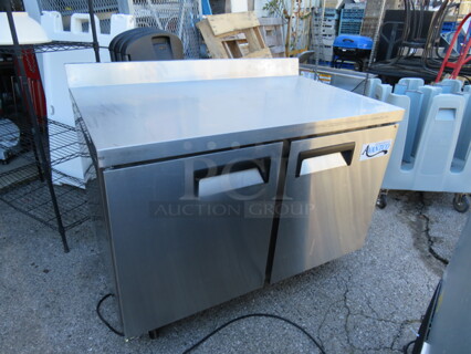 One WORKING Avantco 2 Door Worktop Refrigerator With 2 Racks On Casters. Model# 178AWT48RHC. 115 Volt. 48X30X39