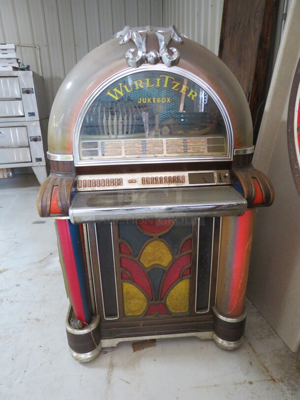 WOW!!!! One 1973 VINTAGE WURLITZER 1050 Jukebox. This Is The Last Year They Were Produced And The RAREST! Less Than 2000 Were Produced And It Is Rare To See One For Sale. Powers On Can Here Static Form The Speakers, Lights Work Somewhat Think Maybe Some Bulbs Are Out, The Plastic Covers On Bottom Sides..... Right Side Is Gone, Left Side Is Cracked.Model# 1050. Serial # 815016. 115 Volt. 