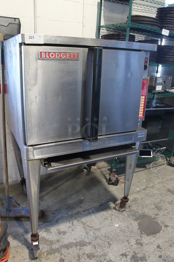 Blodgett Stainless Steel Commercial Electric Powered Full Size Convection Oven w/ Solid Doors, Metal Oven Racks and Legs on Commercial Casters. 208 Volts, 3 Phase.