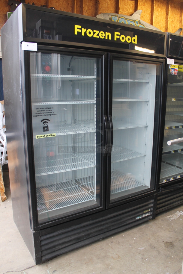2012 True GDM-49F-LD ENERGY STAR Metal Commercial 2 Door Reach In Freezer Merchandiser w/ Poly Coated Racks. 208-230 Volts, 1 Phase. Tested and Working!