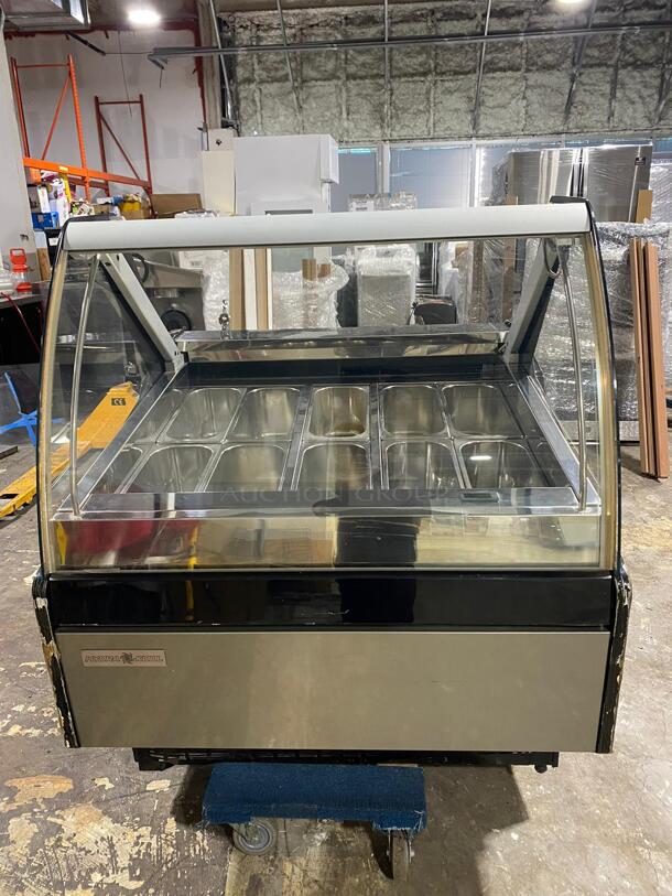 The Hydra-Kool KFM-GL-40-S Gelato/Ice cream Case is a versatile product designed with service type in mind, measuring 40-3/8"W x 43-3/8"D x 48-7/8"H. It has a large capacity of (10) pans ...