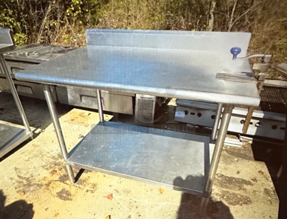 One Stainless Steel Table With Back Splash, SS Under Shelf And A 10lb Edlund Can Opener. 48X30X40