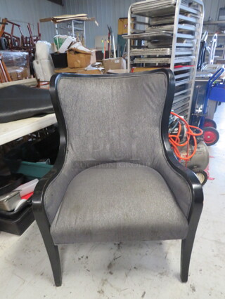 One Wingback Chair.