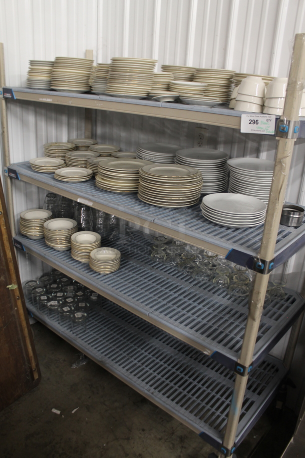 ALL ONE MONEY! Lot of Contents of Shelving Unit Including Plates, Bowls and Glasses. Does Not Include Shelving Unit. 