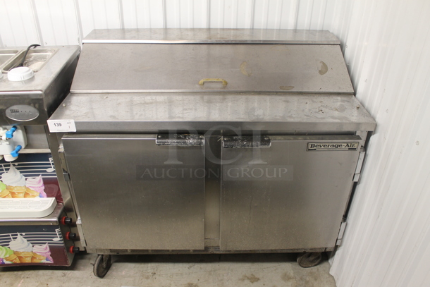 Beverage-Air SP48-12 Commercial Stainless Steel Sandwich/Salad Prep Table With 2 Door Refrigerated Base On Commercial Casters. 115V, 1 Phase. Tested and Powers On But Does Not Get Cold