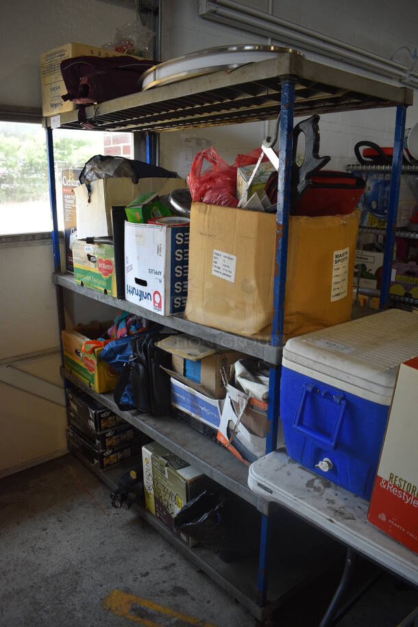 ALL ONE MONEY! Lot of Blue and Gray Metal 4 Tier Shelving Unit w/ Contents Including Rackets, Backsplash Kit and Various Bags. BUYER MUST DISMANTLE. PCI CANNOT DISMANTLE FOR SHIPPING. PLEASE CONSIDER FREIGHT CHARGES. 60x24x72