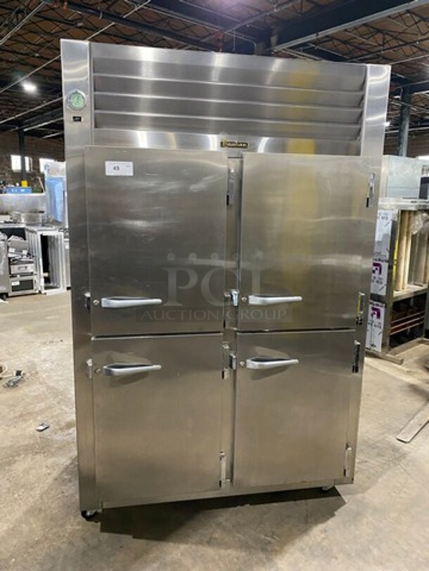 NICE! Traulsen Commercial 4 Split Door Reach In Cooler! With Poly Coated Racks And Built In Pan Racks! All Stainless Steel! On Casters! Model: AHT232NUT122 SN: T722770L99 115V 1 Phase - Item #1127405