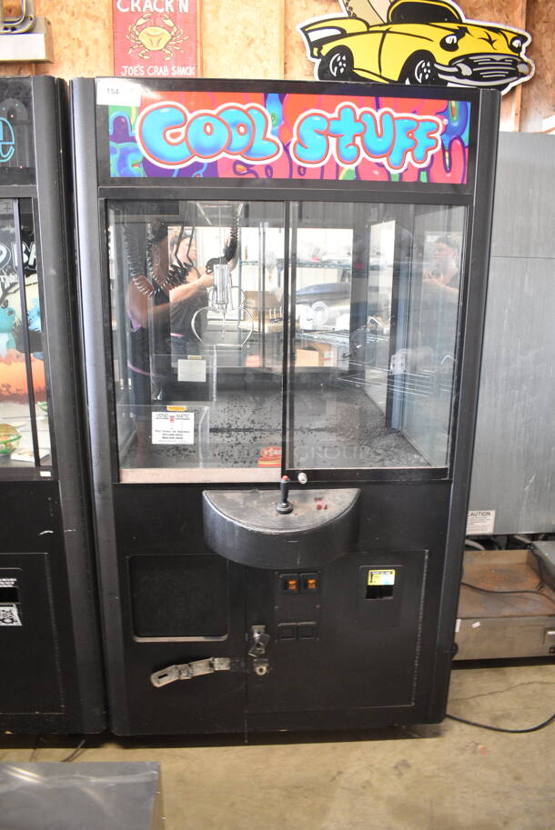 Rainbow Crane NC42 Metal Commercial Floor Style Claw Machine. 110 Volts, 1 Phase. Tested and Does Not Power On