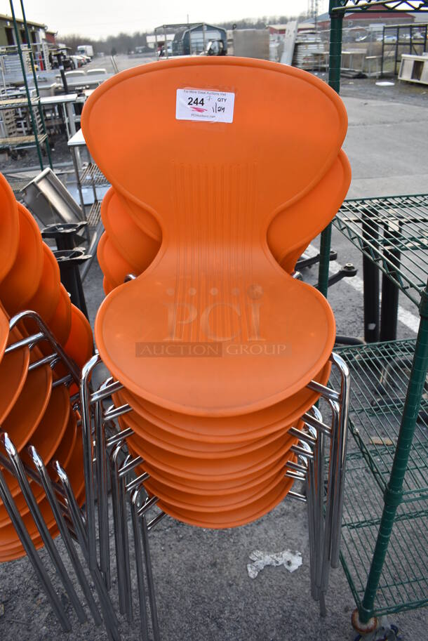 7 Dining Chairs w/ Orange Seat on Metal Legs. 20x20x32. 7 Times Your Bid!