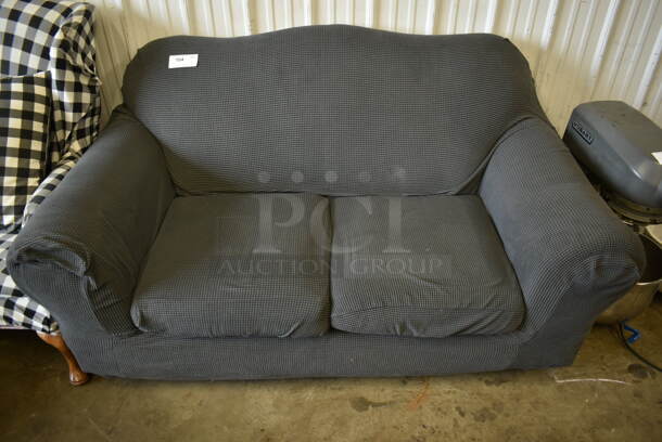 Gray 2 Seater Couch w/ Arm Rests.