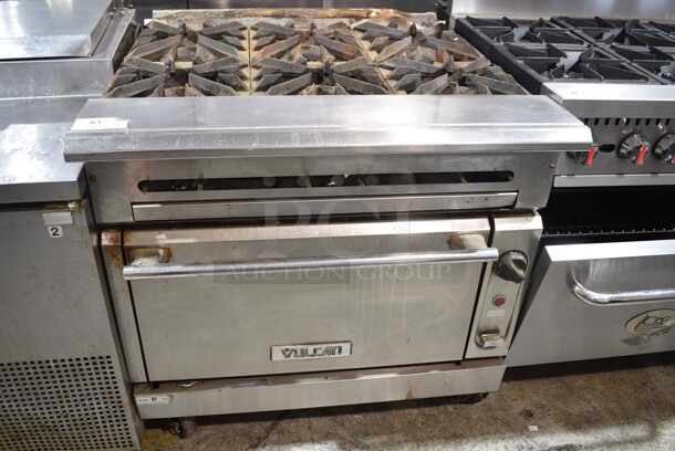 Vulcan V6B36S Stainless Steel Commercial Natural Gas Powered 6 Burner Range w/ Oven on Commercial Casters. 