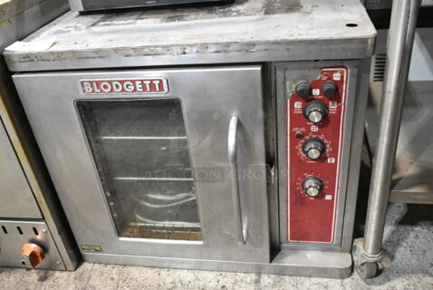 Blodgett Stainless Steel Commercial Half Size Convection Oven w/ View Through Door, Metal Oven Racks and Thermostatic Controls. 