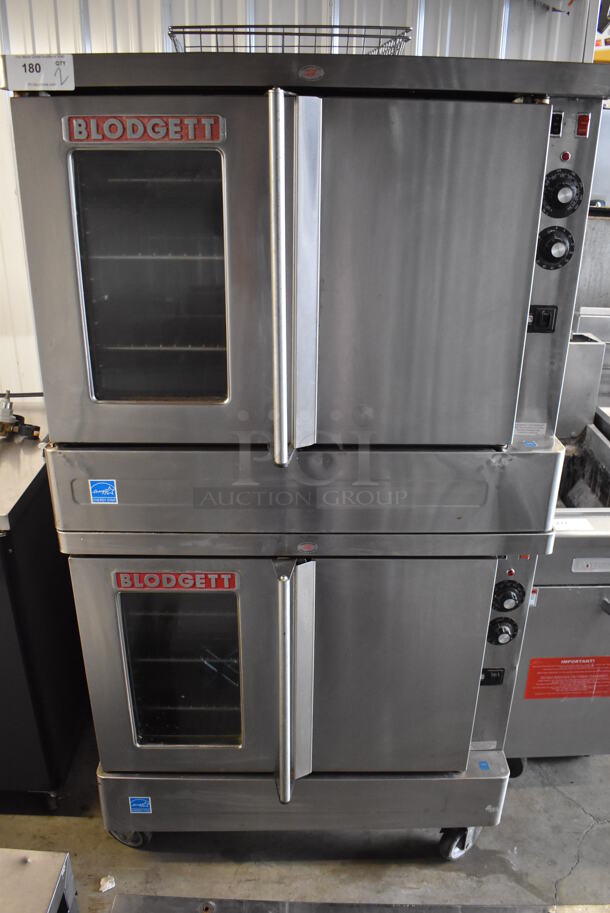 2 Blodgett ENERGY STAR Stainless Steel Commercial Electric Powered Full Size Convection Ovens w/ View Through Door, Solid Door, Metal Oven Racks and Thermostatic Controls on Commercial Casters. 220-250 Volts. 38x40x70.5. 2 Times Your Bid!