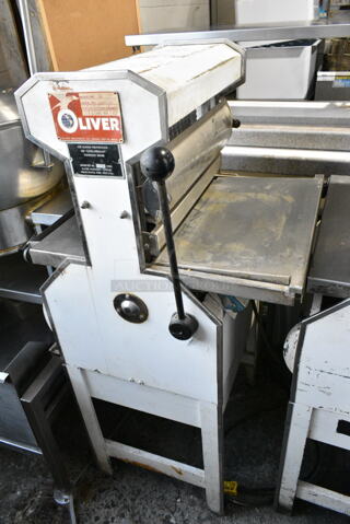 Oliver 777 Metal Commercial Floor Style Bread Loaf Slicer. 115 Volts, 1 Phase. Tested and Does Not Power On