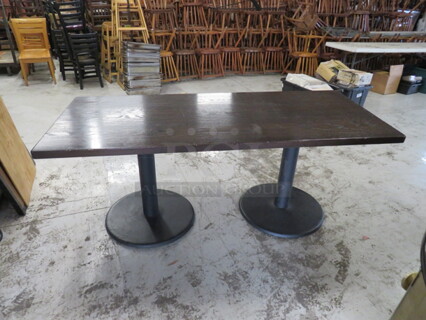 One 1.5 Inch Thick Solid Wood Table On A Dual Pedestal Base. 72X30X30.