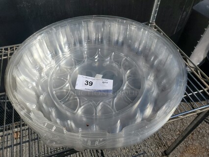 One Lot of Round Plastic Covers
17" in diameter