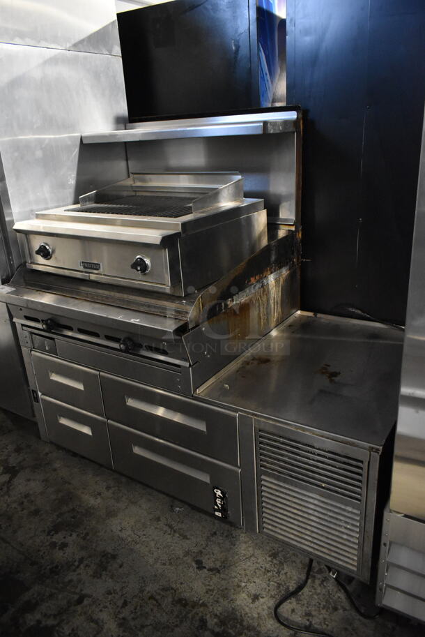 Stainless Steel Commercial Flat Top Griddle w/ 4 Drawer Chef Base on Commercial Casters. Does Not Come w/ Charbroiler. Tested and Powers On But Does Not Get Cold