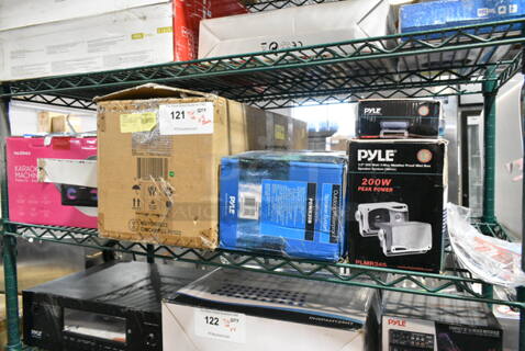 5 IN ORIGINAL BOX! Items Including Pyle Water Resistant Stereo Housing, Pyle PLMR24S Mini Box Speaker System, Pyle PDWR30B Outdoor Waterproof Speaker System, Masingo Karaoke Machine. 5 Times Your Bid! 