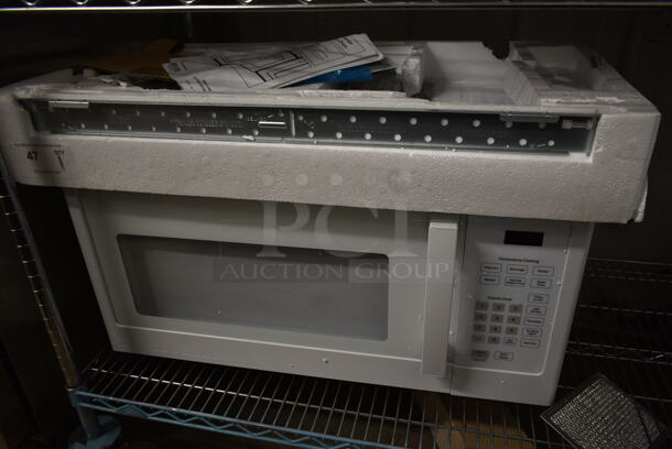 BRAND NEW SCRATCH AND DENT! 2022 General Electric GE JVM3160DF8WW Metal Microwave Oven. 120 Volts, 1 Phase. 
