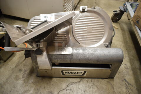 Hobart 1612E Stainless Steel Commercial Countertop Automatic Meat Slicer. 115 Volts, 1 Phase. 