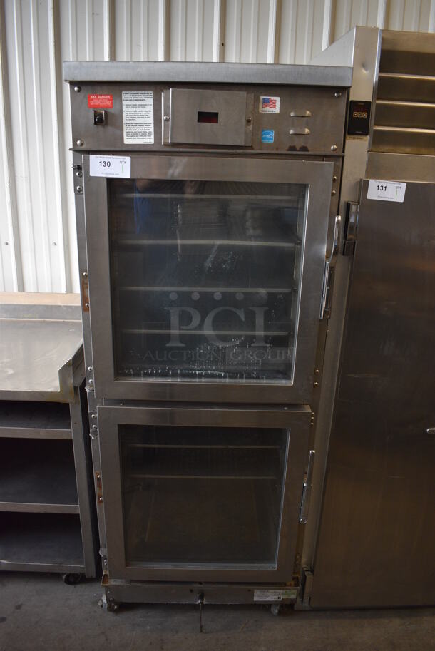 2012 Winston CVap Model HA4522ZE Stainless Steel Commercial 2 Half Size Door Reach In Warming Holding Rack on Commercial Casters. 120 Volts, 1 Phase. 27x33x73. Tested and Working!