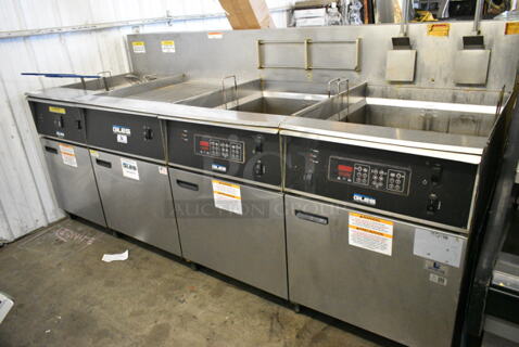 Giles EOF-24 Stainless Steel Commercial Electric Powered 3 Bay Fryer w/ Giles EOF-BIB Dumping Station and 4 Metal Fry Baskets. 480 Volts, 3 Phase.