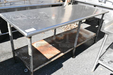 Stainless Steel Table w/ Metal Under Shelf. (out back)