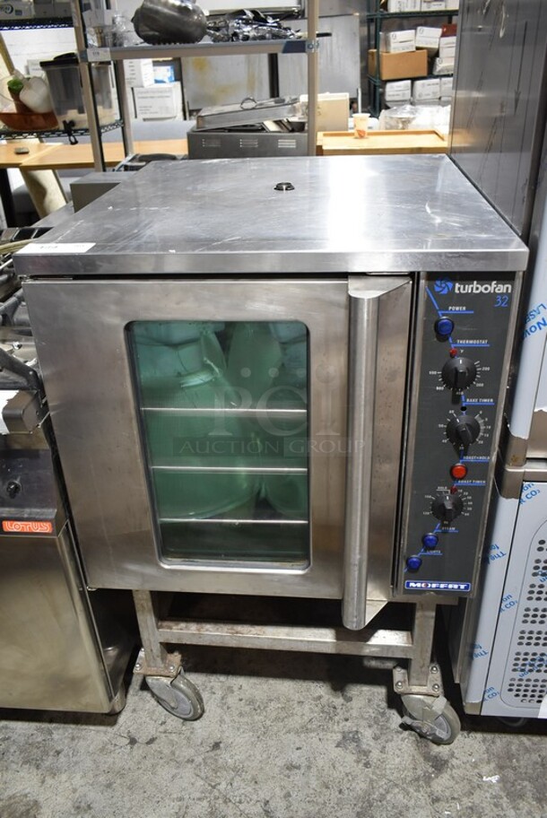 Moffat Turbofan E32MS Stainless Steel Commercial Full Size Electric Touch Screen Convection Oven with Steam Injection on Equipment Stand w/ Commercial Casters 220-240 Volts.
